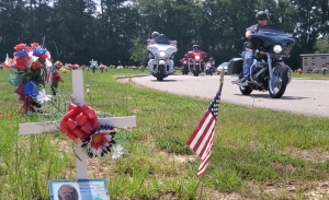 Motorcycles from several clubs roll into Richmond County Memorial Park to view the headstones of five Richmond County veterans that were paid for by the Operation Tombstone ride.
