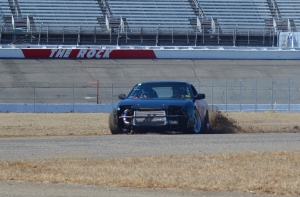 A driver in MB Drift&#039;s season opening Ice Breaker Challenge at Rockingham Speedway kicks up dirt after sliding into a curve on the road course. See more photos on the RO&#039;s Facebook page.