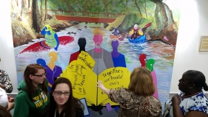 A new mural, created by youth and seniors working together, was unveiled Tuesday at the Richmond County Department of Social Services.