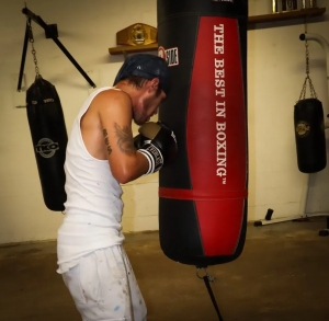 Grant &quot;Sweet Pea&quot; Steen gets in some time on the punching bag at Dungeon Boxing Club.