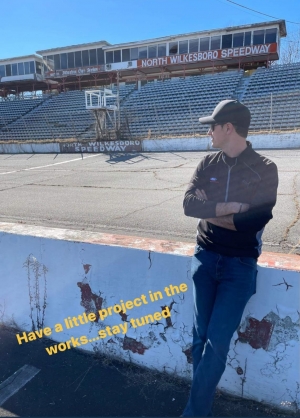 NASCAR driver Joey Logano stands at the legendary North Wilkesboro Speedway, teasing a &quot;little project.&quot;