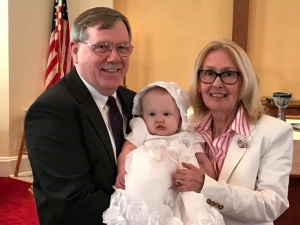 Superior Court Judge Tanya Wallace, pictured with husband Lee and granddaughter Avery, will retire at the end of July.
