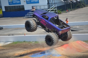 Driver Shannon Quick sails through the air after jumping a ramp during the Monster Truckz show at Rockingham Speedway last summer.
