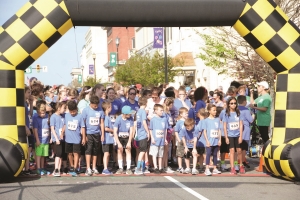 Students line up prior to the start of last year&#039;s Run for the Ribbons 5K in downtown Rockingham. This year&#039;s race is on April 13.