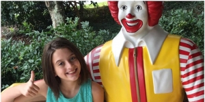 Tatum Rhyne with Ronald McDonald, the charity she supported for her eleventh birthday.