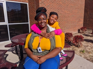 Richmond Community College Pre-Nursing student Latecia Smith and her daughter, Sanira, have worked together to make their virtual classrooms at home a good learning environment.