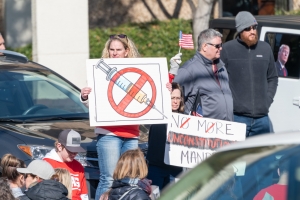 Moms for Liberty demonstrates outside the N.C. Commission for Public Health meeting in Raleigh on Feb 2, 2022.