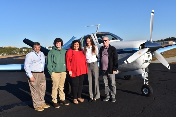 With the help of Career Development Coordinator Jason Perakis, Captain Alan Sowell of United Airlines and Jason Gainey at the Richmond County Airport, Maylyn Wallace, a senior at Richmond Senior High School, boarded a flight Tuesday morning to Florida to tour Embry–Riddle Aeronautical University.