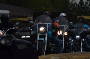 A line of motorcyle riders leave Crossroads Saloon Sunday in the Caleb Bundy Memorial Ride.
