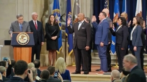 Richmond County Sheriff James Clemmons, along with 17 other members of the justice community, are sworn in to the Presidential Commission on Law Enforcement and the Administration of Justice on Wednesday.