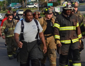First responders from across Richmond County begin a 3-mile trek from the old courthouse to Walmart in remembrance of 9/11 victims. See more photos on the RO&#039;s Facebook page.