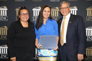 UNCP senior Denise Salvetti (middle) poses with keynote speaker Donna Chavis and Chancellor Robin Gary Cummings.