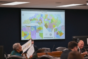 The N.C. Senate proposal of new state Senate districts is displayed on a large screen as the N.C. General Assembly members debate the proposed redistricting maps on Tuesday November 2, 2021.