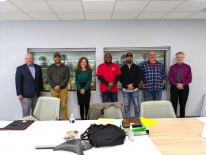 Dr. Dale McInnis, president of Richmond Community College, stands with the VBC | Manufacturing employees who completed Green Belt Six Sigma training. Pictured left to right is McInnis, Dr. Clifton Dial, Nadia Branham, Otis Harrell Jr., Donovan Sanderson, Jesse Sheppard and Dr. Ronald Fite, instructor for the class.