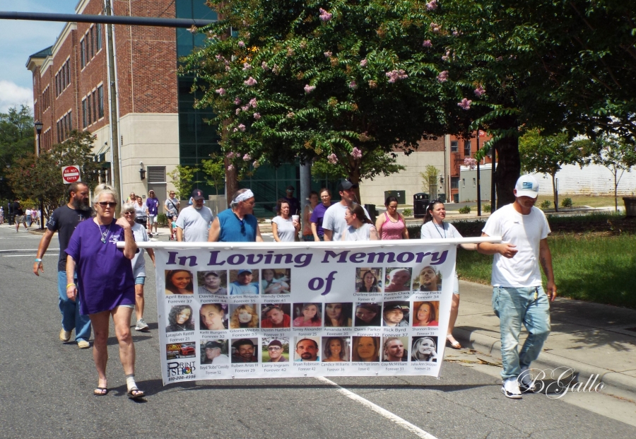 Those who have lost loved ones to drug overdoses march in downtown Rockingham Aug. 14 to bring awareness to drug addiction. See more photos at the bottom of this story.