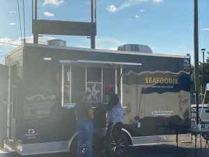 The Seafoodie Food Truck will provide 300 meals at Dobbins Heights on July 26. There will also be information packets regarding COVID-19 and face masks given out to attendees.