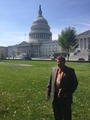 The Rev. James Brigman stands outside the U.S. Capitol in 2017 after marching from Rockingham in hopes to get help for his medically fragile daughter.
