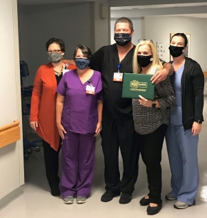From left to right: Deanna Kearns, R.N., Administrative Director, Corporate Education &amp; Professional Development; Tammy Hussey, R.N., Clinical Nurse Leader, First Surgical; Jason Grooms, R.N., Karen Robeano, DNP, R.N., Chief Nursing Officer; and Shannon Smith, R.N., Administrative Director, Med/Surg.