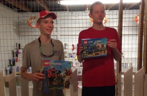 Austin and Hayden Hadinger pose with their Lego prizes following their first and second place finishes. (Not pictured: Reece Gentry)