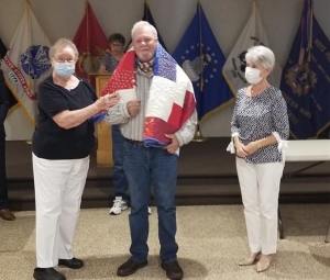 R.J. Hewitt, of Ellerbe, is awarded a Quilt of Valor by the Sandhills Quilters Guild in Southern Pines on Veterans Day.