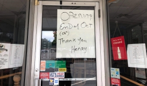 A sign on the door of Henry&#039;s Uptown Café in Rockingham announces that it will be reopening at the end of October.